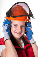A girl wearing ear protection.