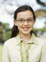 Girl with a ponytail and glasses.