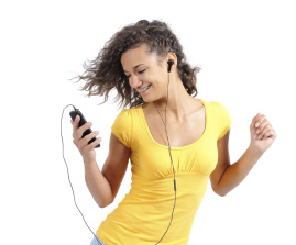 young woman with audio device wearing earbuds and dancing