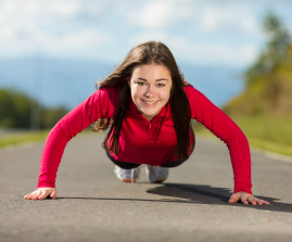 young woman in push-up position