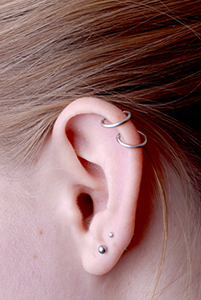 Ear with multiple piercings