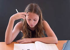 A girl studying.