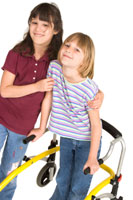 Girl helping a girl with a walker.
