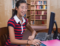 A girl using her computer.
